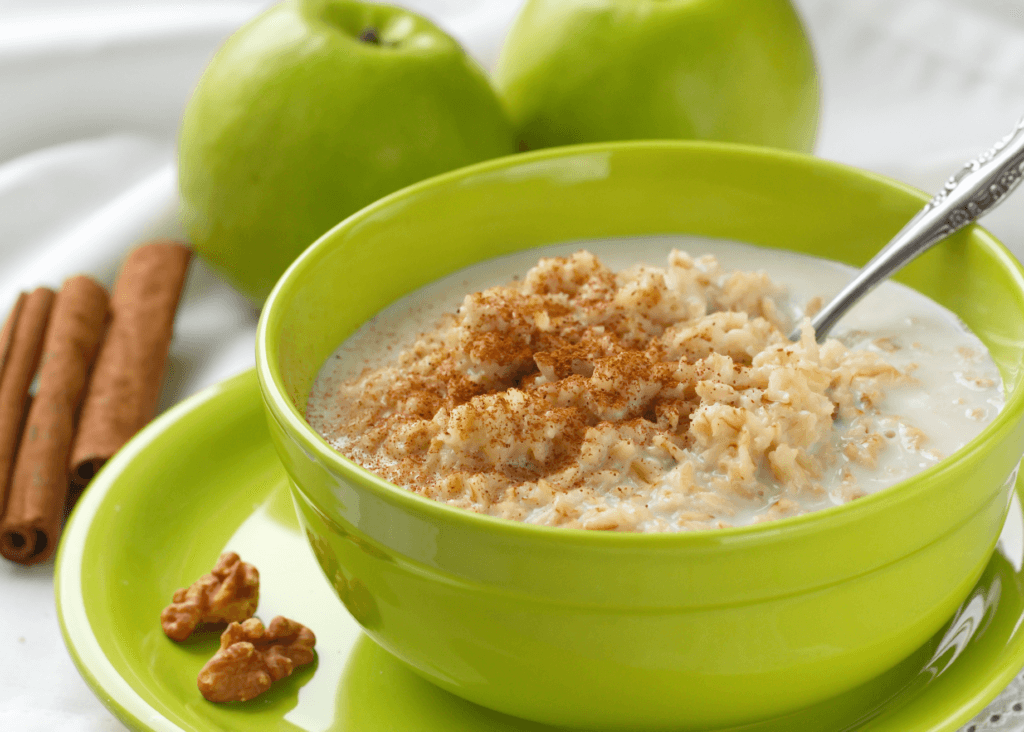 apple cinnamon oats in a green bowl