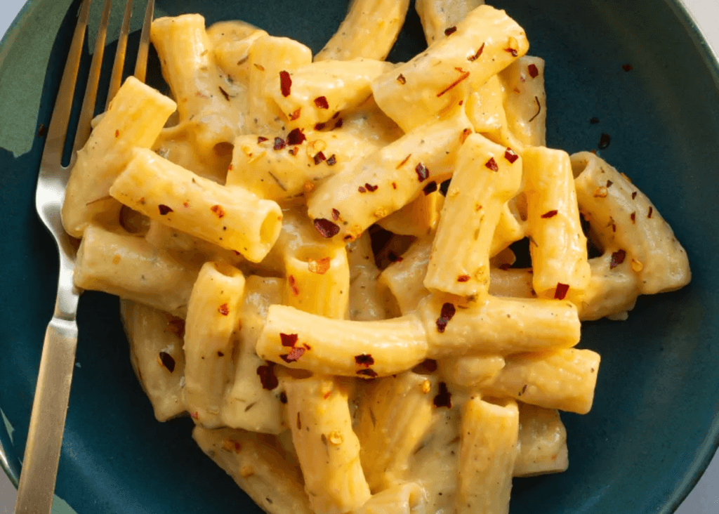 Butternut Squash Macaroni and Cheese in a black bowl