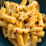 Butternut Squash Macaroni and Cheese in a black bowl