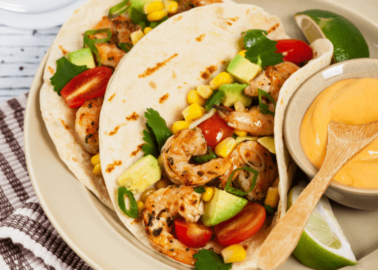 Tomato Corn Avocado Salsa on shrimp tacos