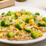 Fried rice with broccoli on a white plate