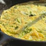 Broccoli Feta Frittata in a cast iron skillet