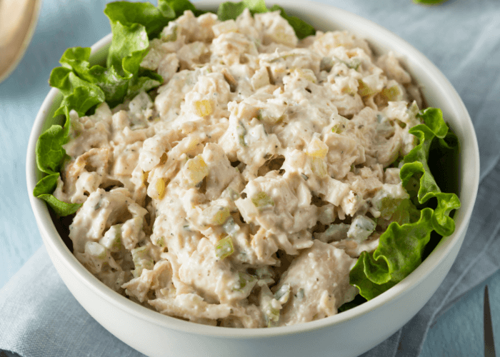Picnic Chicken Salad in a bowl with lettuce