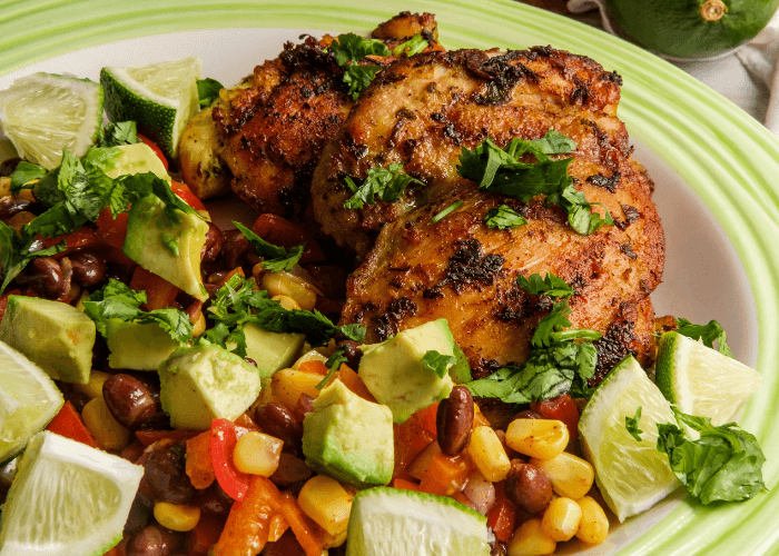 Cilantro lime chicken with avocado corn and tomatoes