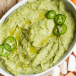 Avocado Hummus with jalapenos served with veggies and crackers