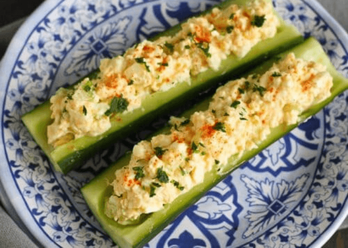 Egg salad in cucumber boats