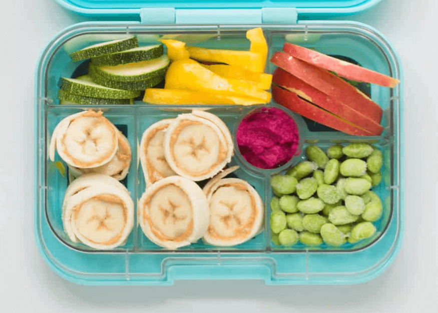 Wraps with banana and peanut butter in a lunch box