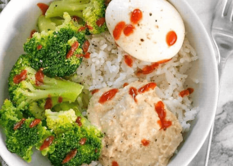 Hummus Breakfast Bowls with rice, broccoli, egg, and sriracha