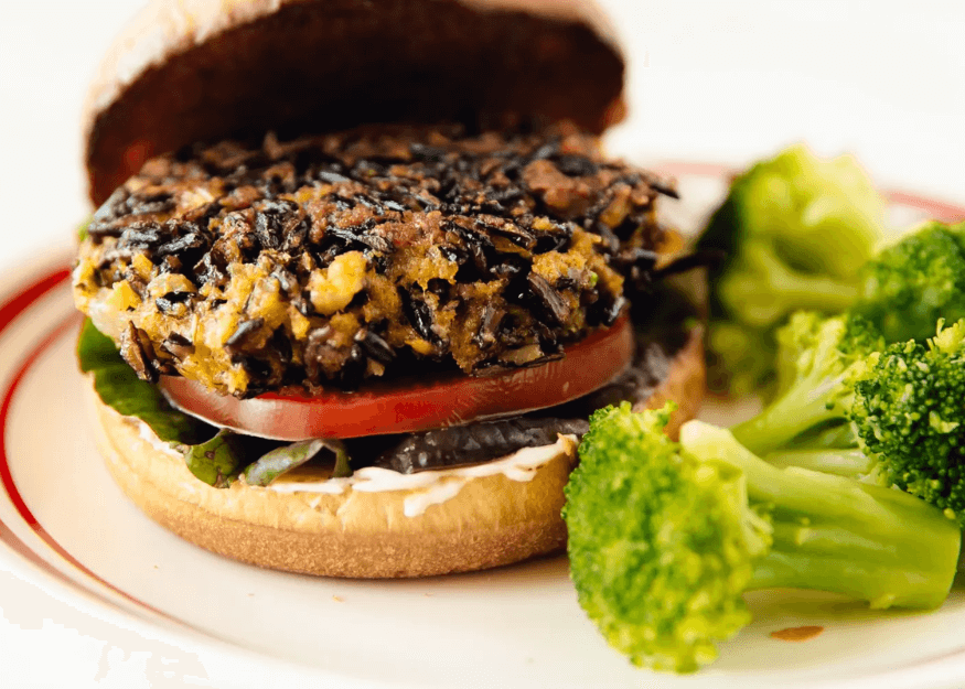 Wild Rice Hamburgers on a bun with broccoli florrets