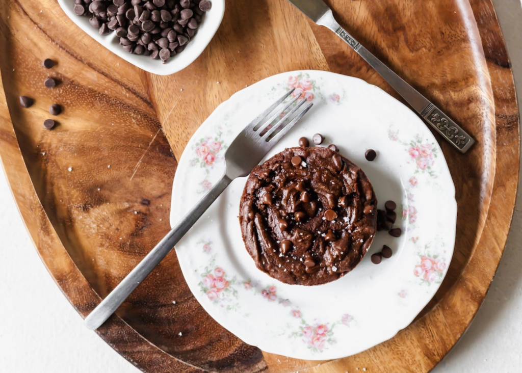 Vegan Single Serving Brownie on a white plate on a cutting board