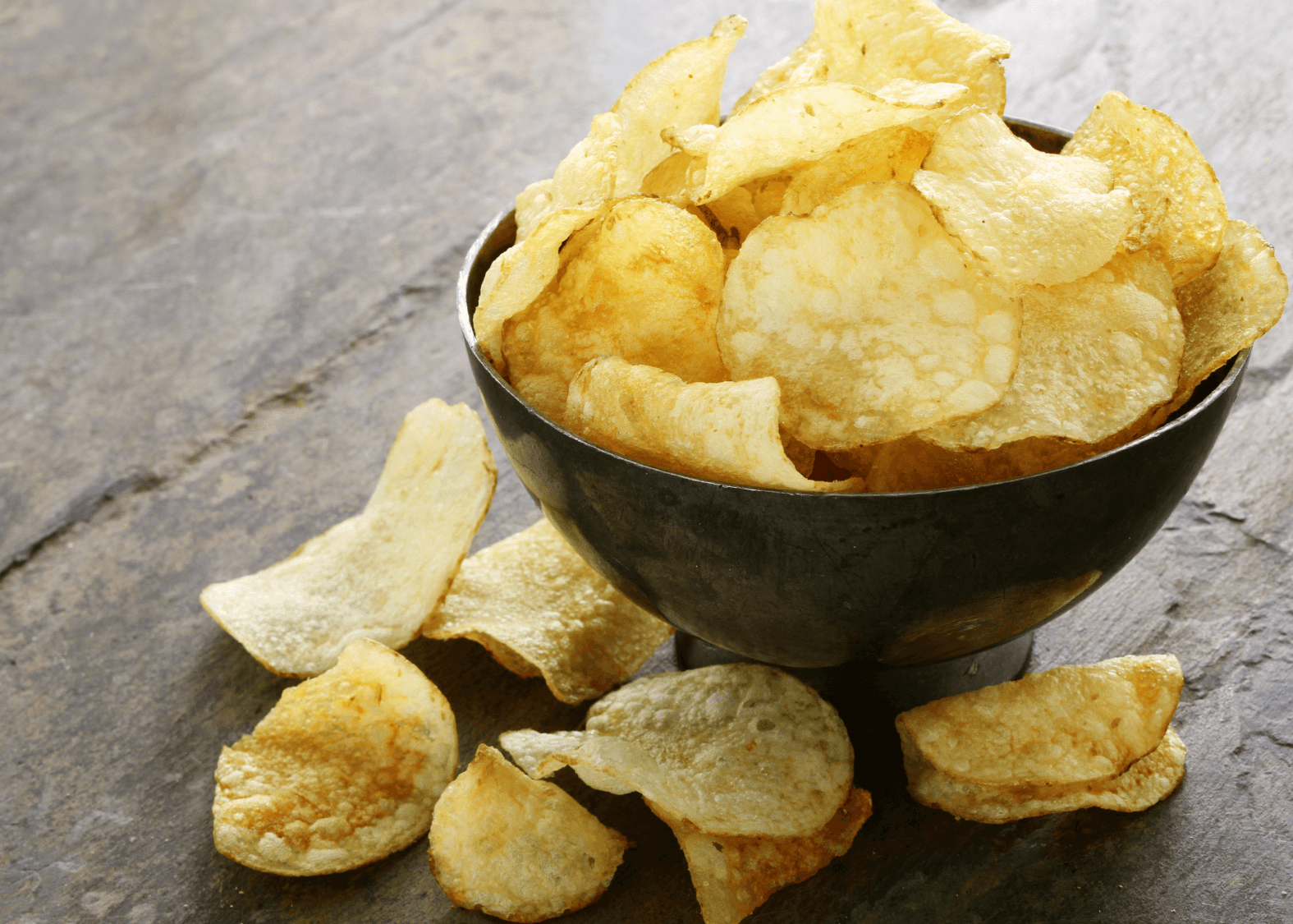 Microwave Potato Chips in a black bowl