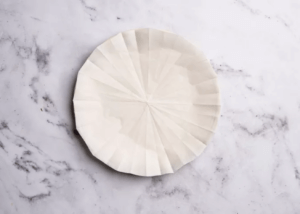 Parchment paper on a plate on a countertop