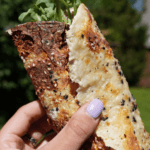 hand holding Cottage Cheese Wrap with lettuce