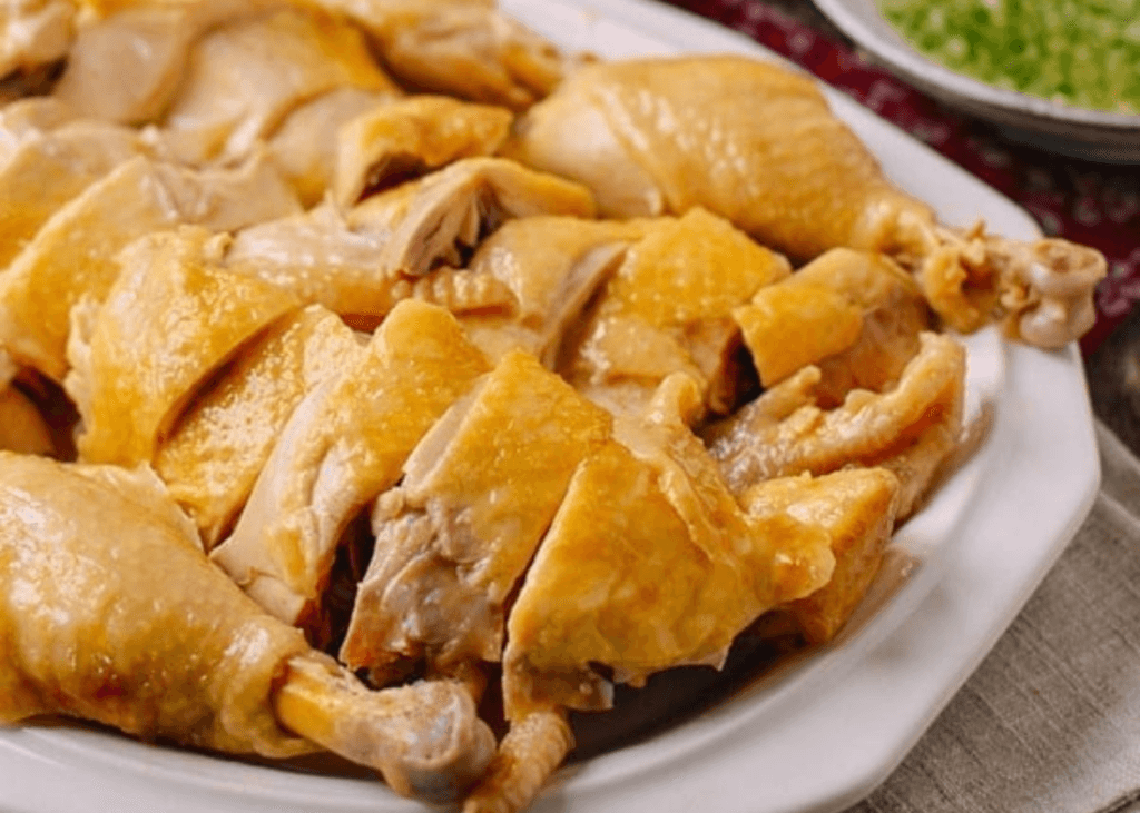 Cantonese Poached Chicken cut in a white bowl