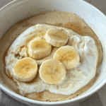 Pancake in a bowl with Greek yogurt and banana slices