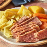 Corned beef, cabbage, potatoes, and carrots on a plate